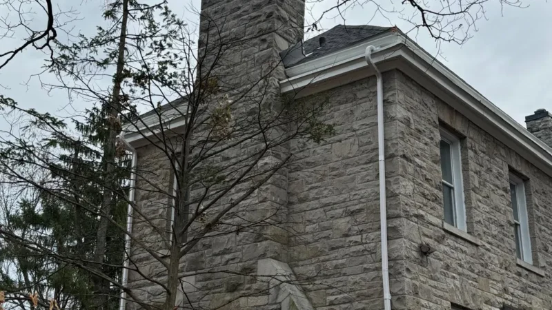 Side view of a house and chimney