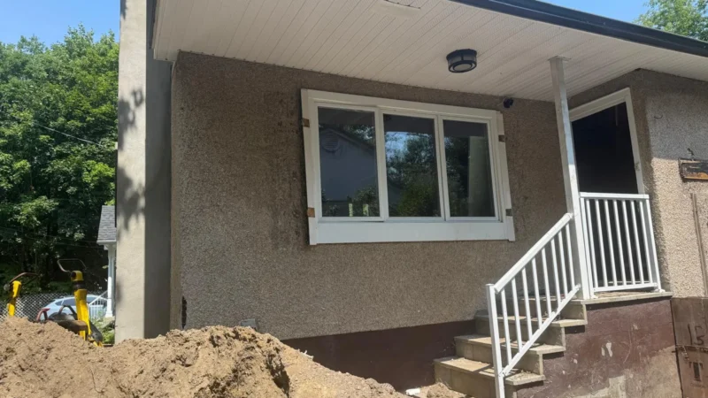 House under construction, front door and window